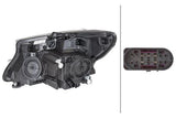 HELLA 1EL011284-881 — Headlights