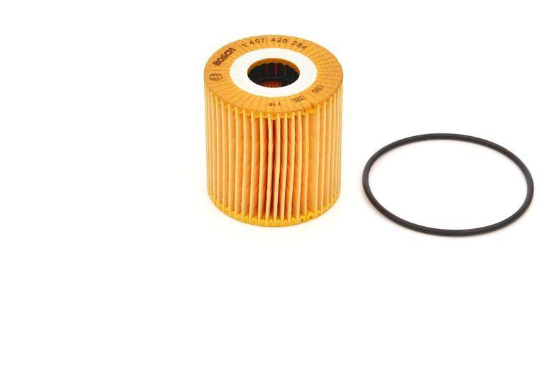bosch oil filter 1457429284 product image, technical specifications of bosch oil filter, oil filter compatibility for nissan vehicles BOSCH Oil Filter 1457429284 - Compatible with Almera, Navara, Primera | 75 mm Height BOSCH Oil Filter 1457429284 for Nissan Vehicles bosch, oil-filter, nissan-parts, engine-maintenance, car-accessories, mechanics-tools, automotive-filter, engine-oil-filter, car-owners, ai-generated