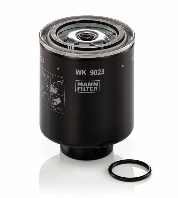 mann wk9023z fuel filter, fuel filter installation, mechanic using fuel filter MANN WK9023Z Fuel Filter – Premium Quality Fuel Filtration for Car Owners and Mechanics | 4.41 in. Height MANN WK9023Z Fuel Filter - High Performance for Mechanics fuel-filter, mann, car-owners, mechanics, high-performance, automotive, screw-type, engine-parts, vehicle-maintenance, ai-generated