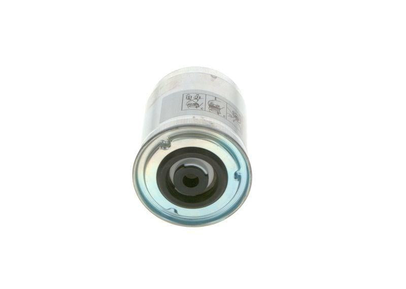 bosch diesel filter 1457434400, fuel filtration solution by bosch, technician installing bosch fuel filter BOSCH Diesel Filter 1457434400 - Durable Fuel Filtration for Vehicle Owners & Automotive Technicians | 3.58 in Tall BOSCH Diesel Filter 1457434400 bosch, diesel-filter, fuel-filtration, automotive-parts, vehicle-maintenance, automotive-technicians, engine-protection, automobile-accessories, ai-generated, reliable-performance