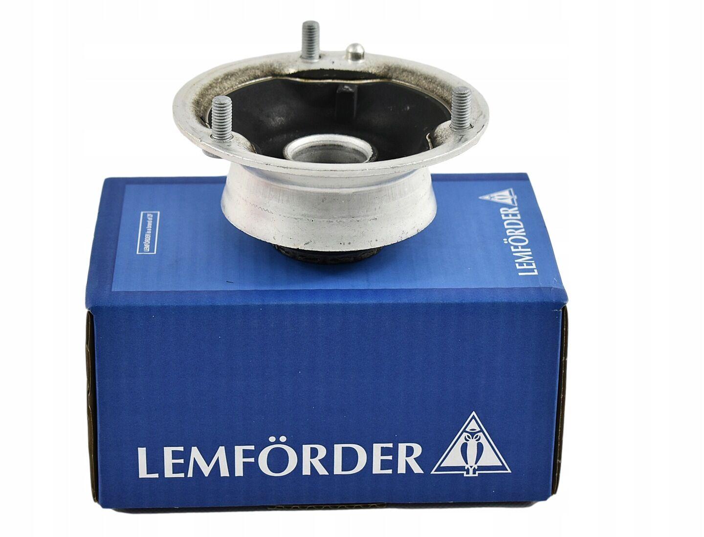lemforder bmw 1 series e81 e87 front shock mount, lemforder front shock mount in packaging Lemforder BMW 1 Series E81-E87 Front Shock Mount - Compatible with All Models | Premium Quality BMW 1 Series E81 E87 Front Shock Mount by Lemforder bmw, shock-mounts, front-shock-mount, lemforder, car-parts, oe-replacement, suspension-parts, german-engineering, vehicle-accessories, ai-generated