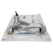 LEMFORDER left lower control arm for Audi Q7, Front left control arm installed on Audi Q7, LEMFORDER control arm side view LEMFORDER Left Lower Control Arm - Precision Fit for Audi Q7 Owners | 2010-2015 Models LEMFORDER Left Lower Control Arm for Audi Q7 2010-2015 audi-q7, left-lower-control-arm, lemforder, suspension-parts, auto-parts, car-maintenance, mechanics, oem-parts, car-owners, ai-generated
