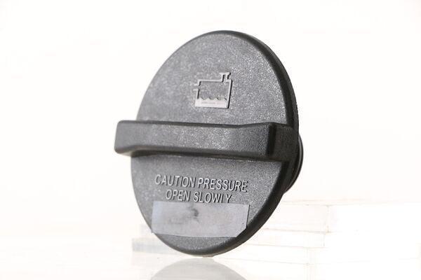 behr-radiator-cap-906-spr-image-1, behr-radiator-cap-package BEHR Radiator Cap 906 SPR - High Quality Cooling System Component | 39g BEHR Radiator Cap 906 SPR - Durable & Reliable behr, radiator-cap, cooling-system, auto-parts, automotive-repairs, high-quality, durable, mechanics-tools, ai-generated, vehicle-maintenance