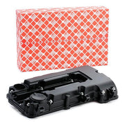 FEBI Bilstein valve cover for Opel Corsa E, Valve cover installed on Opel Corsa E, FEBI Bilstein packaging FEBI Bilstein Valve Cover - Compatible with Opel Corsa E 1.2 / 1.4 | Includes Gasket FEBI Bilstein Valve Cover for Opel Corsa E valve-cover, febibilstein, opel-corsa-e, car-parts, engine-parts, automotive, gasket, mechanics, car-owners, ai-generated