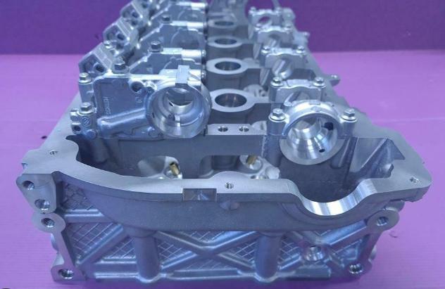 bmw f20 n13 original cylinder head, front view of bmw f20 n13 cylinder head, back view of bmw f20 n13 cylinder head BMW Original Cylinder Head for F20 N13 Engine - Perfect Fit for Your Vehicle | Compatible with Car Owners & Mechanics BMW F20 N13 Original Cylinder Head - For Car Owners & Mechanics bmw, f20, n13, cylinder-head, car-parts, automotive, original-parts, mechanics, car-owners, ai-generated