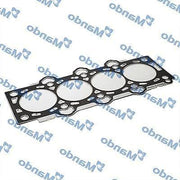 mando cylinder head gasket for accent and i30, mando eghmh00073 gasket installation example MANDO EGHMH00073 - Cylinder Head Gasket for Accent, Era, i30, Ceed | 1.5 CRDI, 1.6 CRDI MANDO Cylinder Head Gasket - For Accent, i30, Ceed cylinder-head-gasket, car-parts, mando, 1-5-crdi, 1-6-crdi, mechanics, car-owners, engine-repairs, ai-generated, high-quality-gasket